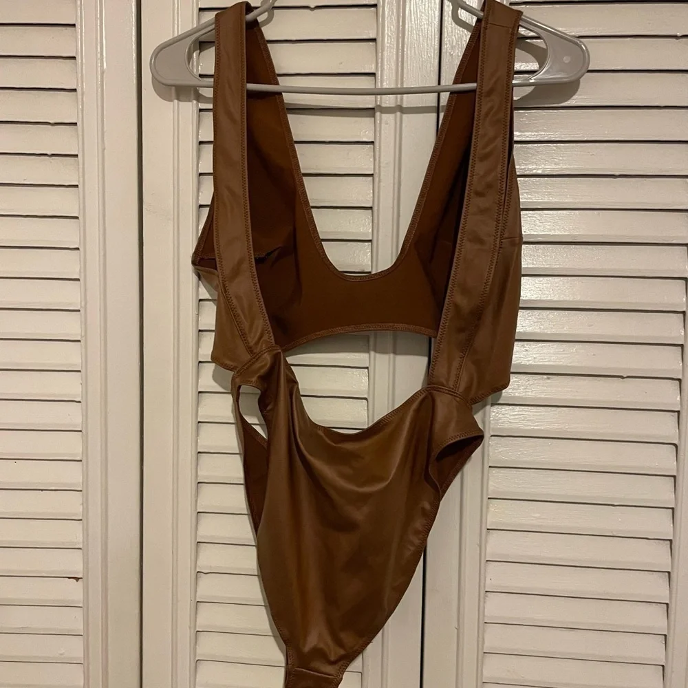 Skims swim cut out one piece suit